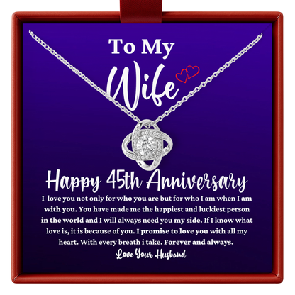 Necklace with a sentimental message for a wife's 45th anniversary, displayed in a jewelry box.
