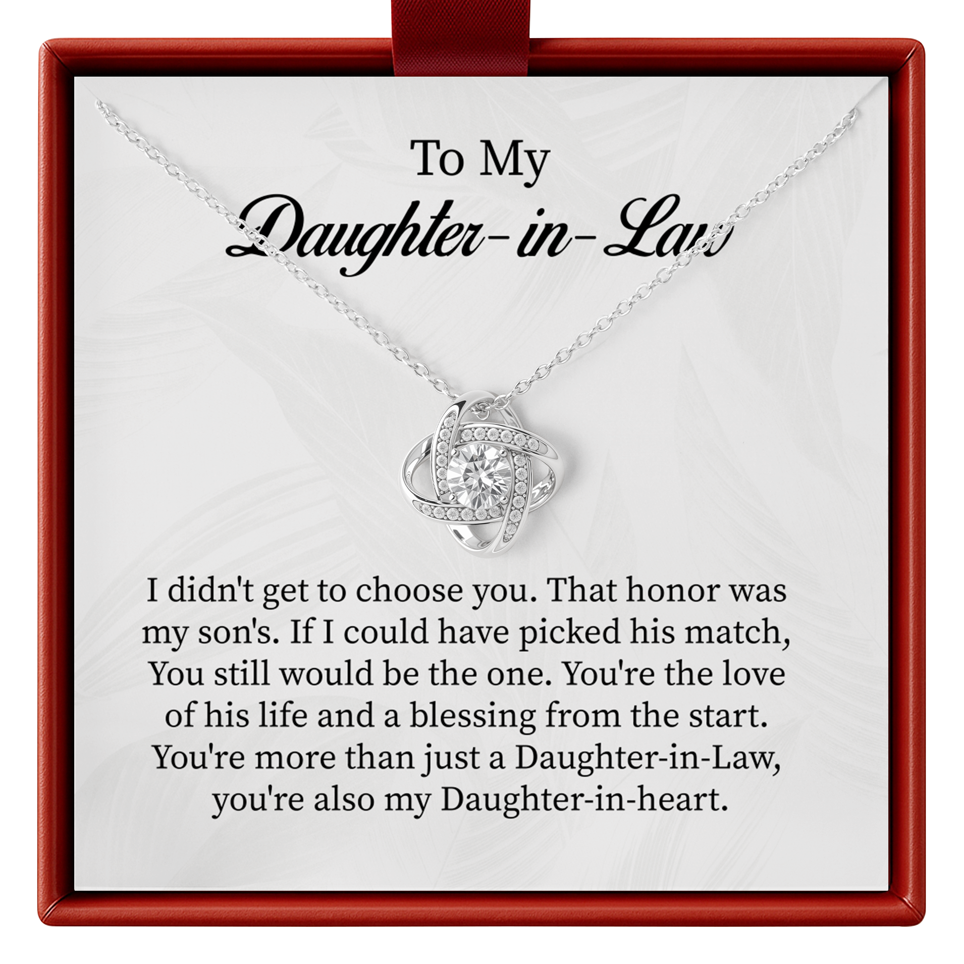 Silver necklace with a heart-shaped pendant on a card for daughter-in-law, placed in a red box.