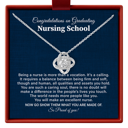 Necklace with a sentimental message card for graduating nursing school on a blue background