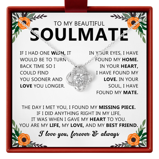 Necklace with a sentimental message card for a soulmate on a white background with floral decorations.