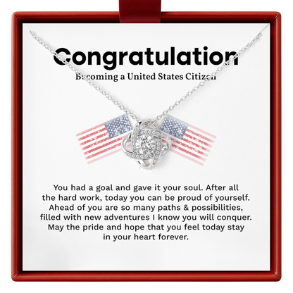 Necklace with American flag design in a congratulatory card for becoming a U.S. citizen.