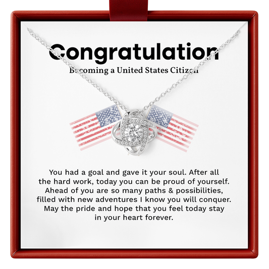 Necklace with American flag design in a congratulatory card for becoming a U.S. citizen.