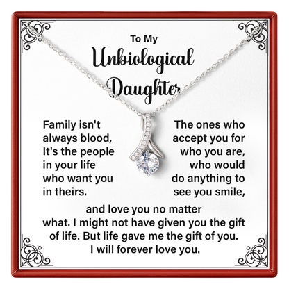 Necklace with a sentimental message card for an 'Unbiological Daughter' on a white background.