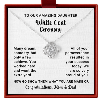 Necklace with a message card for an amazing daughter on a white coat ceremony