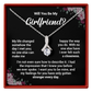 Necklace with a diamond pendant in a box with romantic message, surrounded by floral decorations.