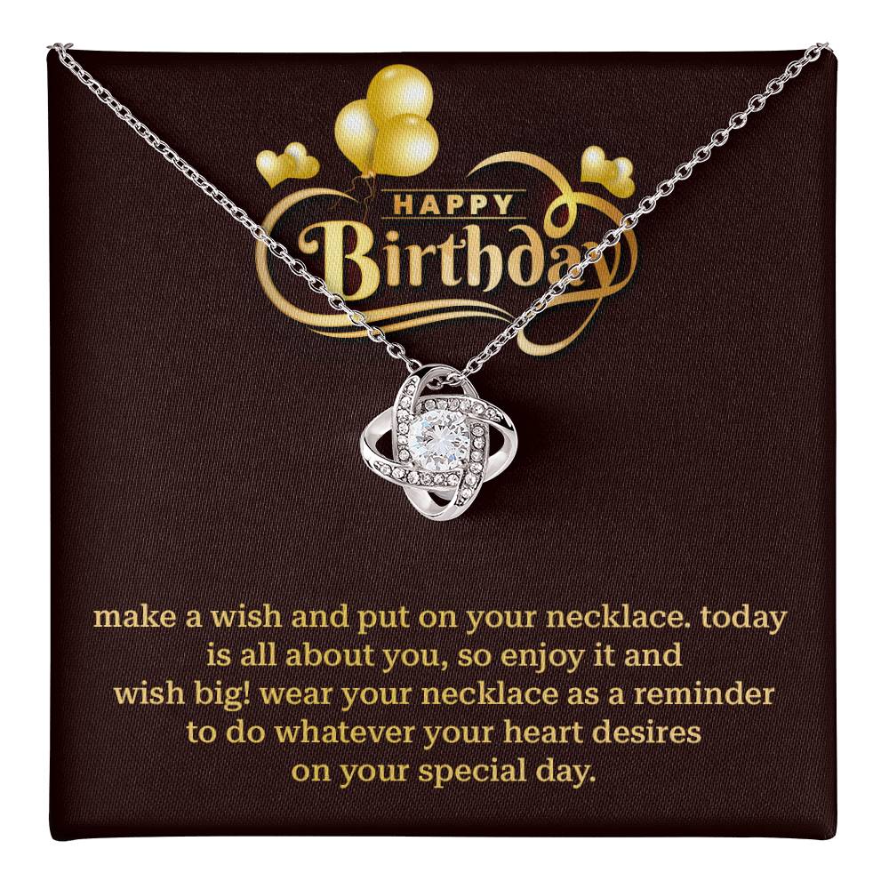 Birthday make a wish and put on your necklace.