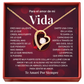 Vida Necklace with heart-shaped pendant in a decorative box with Spanish text